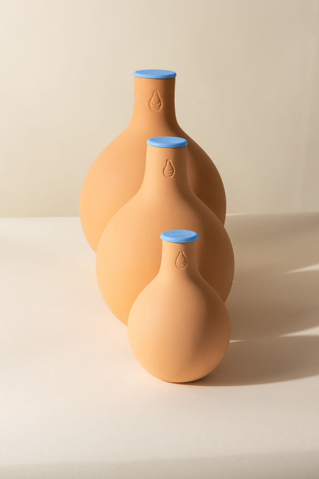 Small, Medium, and Large sizes of Oya Watering pots